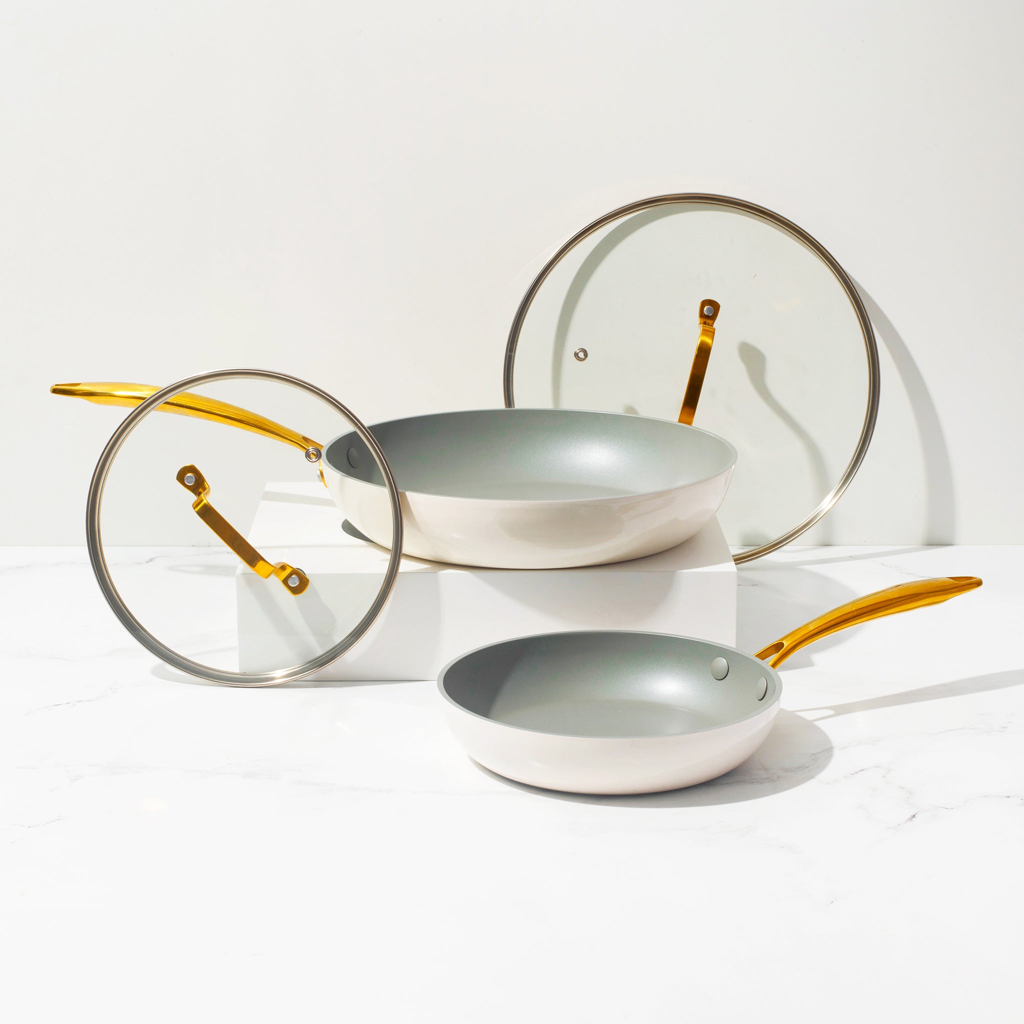 White and Gold Nonstick Frying Pan Set with Lids - Styled Settings