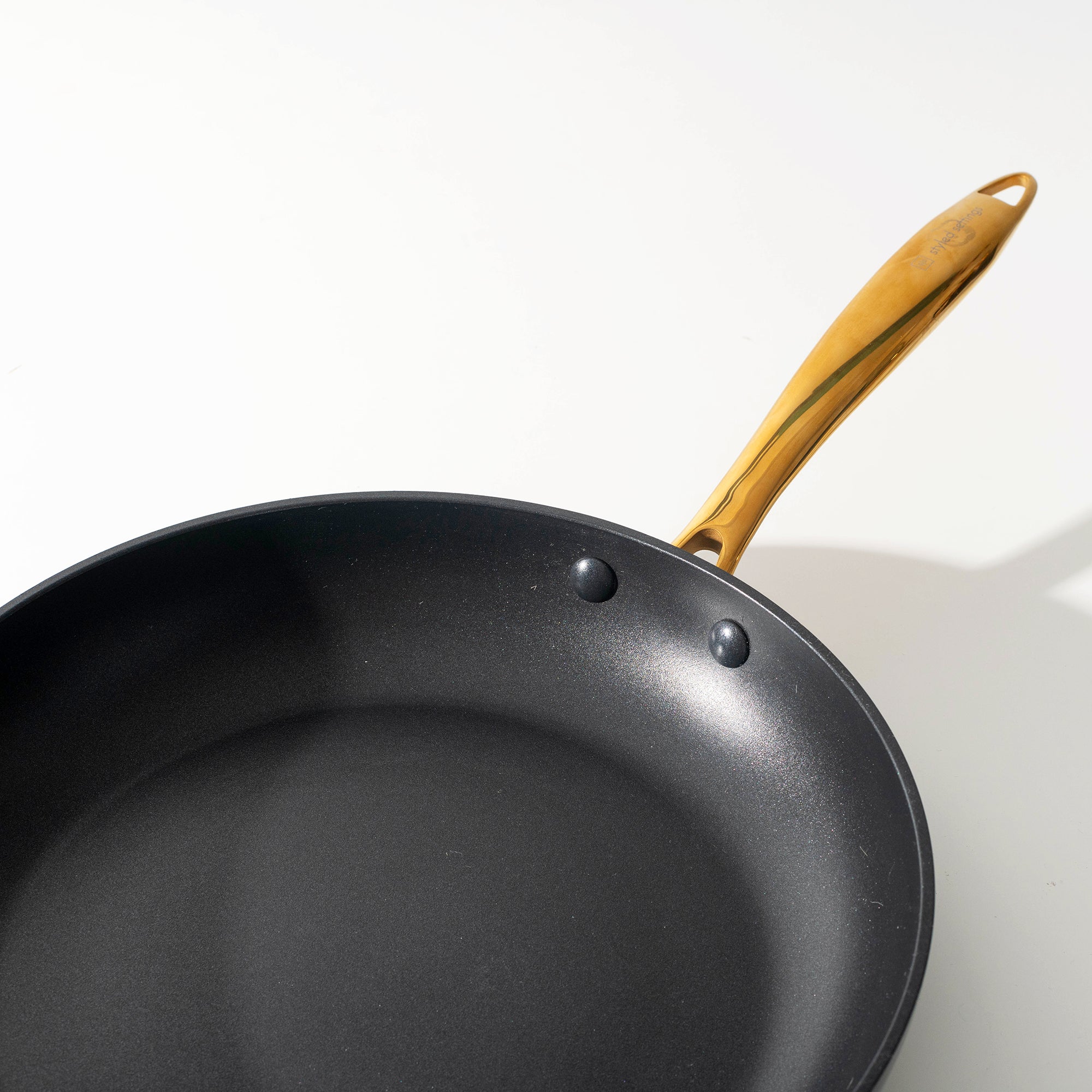 Styled Settings Black and Gold Nonstick Stainless Steel Pots and