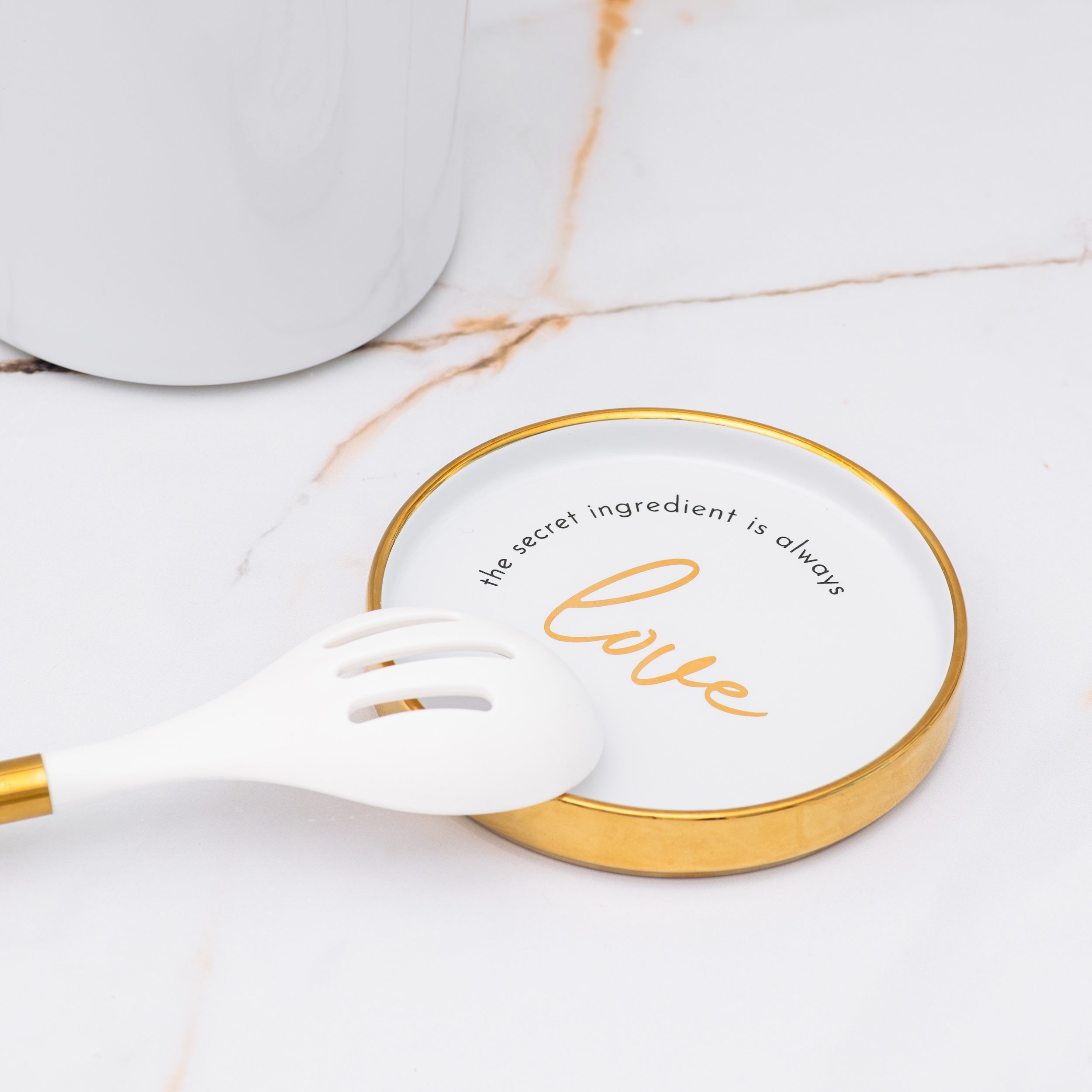 White and Gold Kitchen Utensils and White Utensil Holder with Built-in Spoon Rest